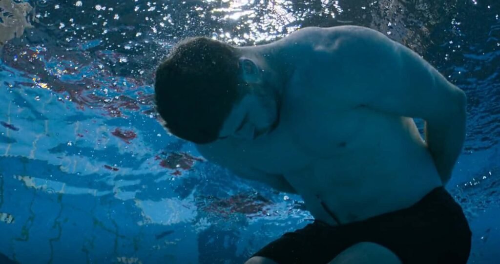 “Limitless with Chris Hemsworth,” National Geographic for Disney+ (Craig Parry). The concept of stress resilience is explored in depth. Hemsworth learns about General Adaptation Syndrome, which outlines the body’s phases of stress response, from acute stress in the alarm phase to the dangers of chronic stress in the exhaustion phase. One key takeaway is the use of cognitive reframing, a psychological technique that helps shift negative thoughts to more constructive interpretations of stress. Hemsworth demonstrates this during high-pressure situations, showcasing how reframing can prevent the body from being overwhelmed.